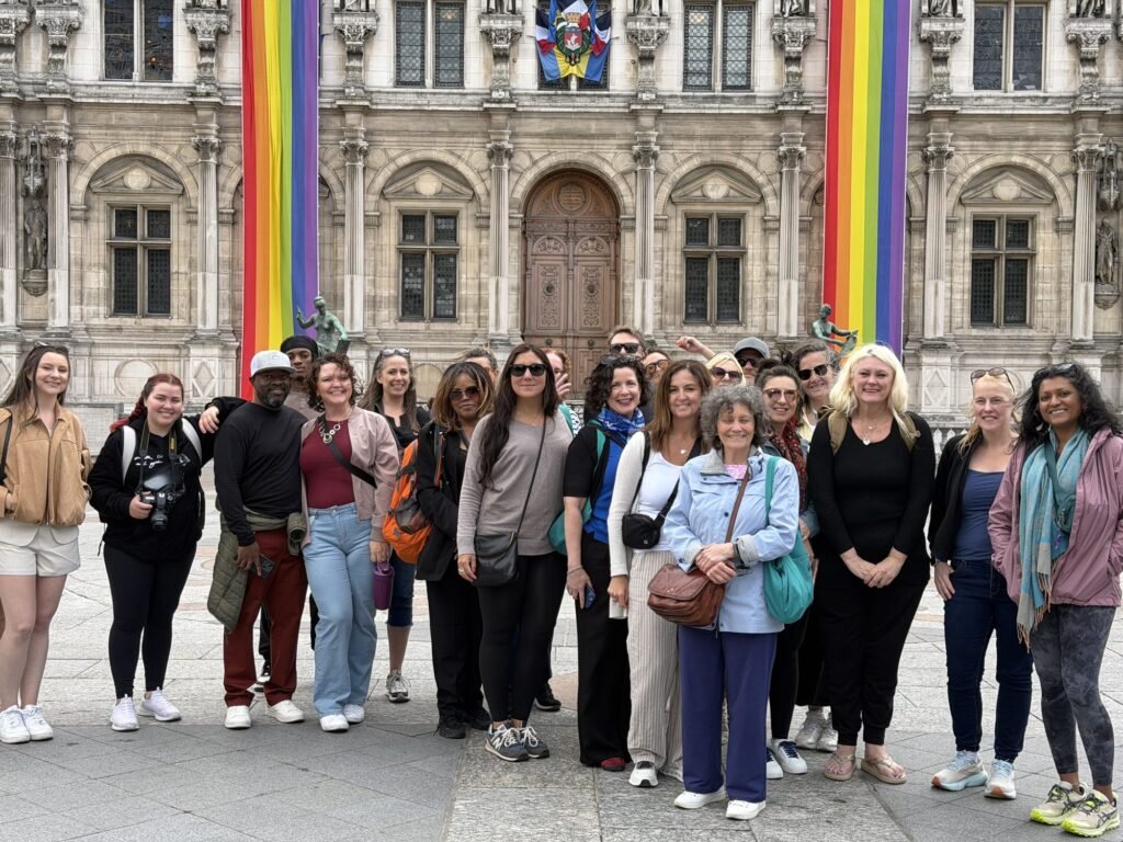 Retreat group together in front of the Hotel de Ville in Paris